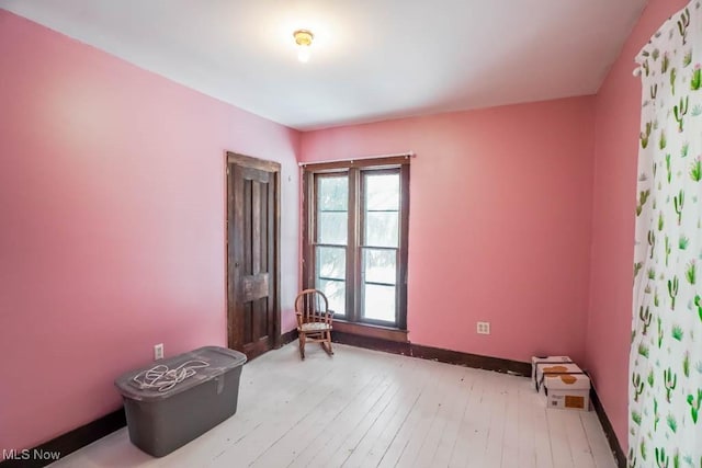 empty room with light wood-type flooring