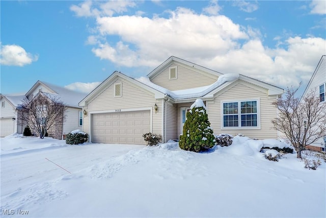 view of front of home featuring a garage