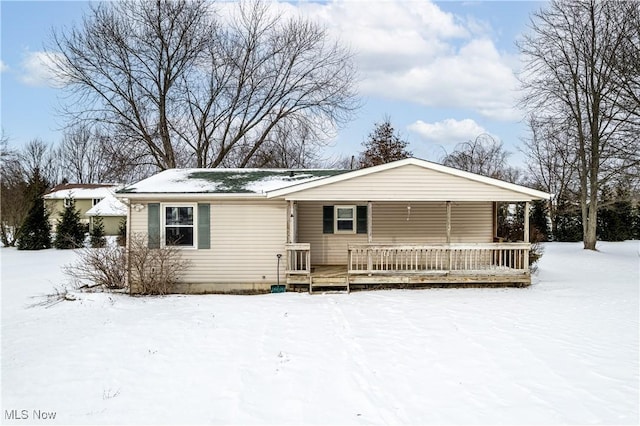 ranch-style home with a deck