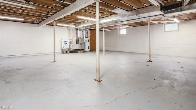 basement featuring electric water heater