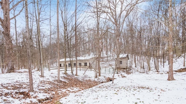 view of yard covered in snow