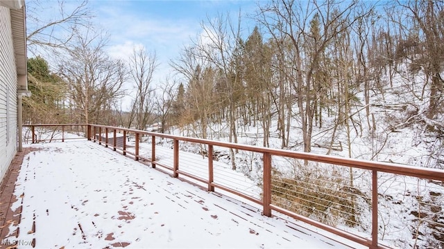 view of snow covered deck