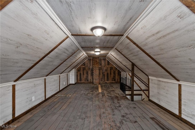 bonus room with wood-type flooring, vaulted ceiling, and wooden ceiling