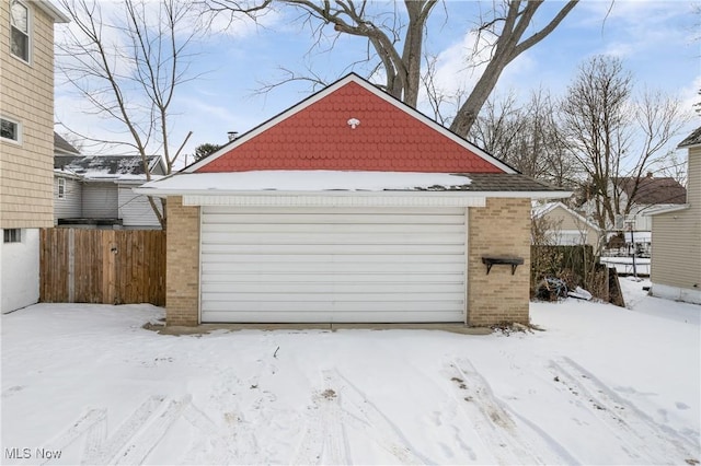 view of snow covered garage