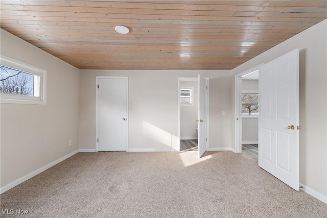 interior space featuring wood ceiling