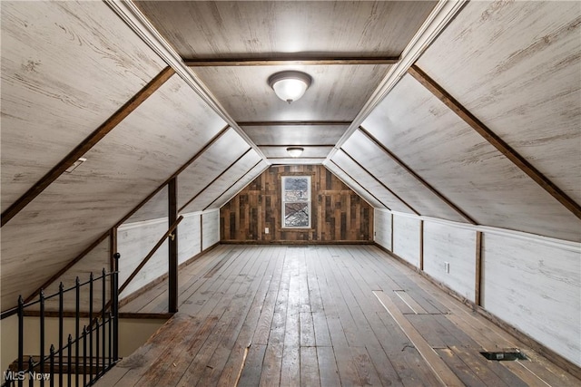 bonus room with vaulted ceiling, wood ceiling, and hardwood / wood-style floors