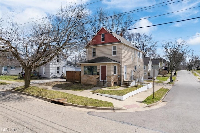 750 Florida Ave, Akron, OH 44314 - traditional style home with stone siding and fence