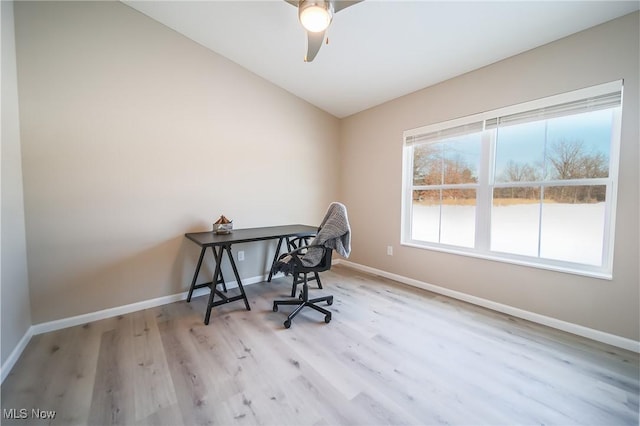 office area featuring lofted ceiling and light hardwood / wood-style floors