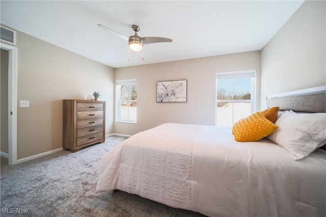 bedroom with ceiling fan and carpet flooring