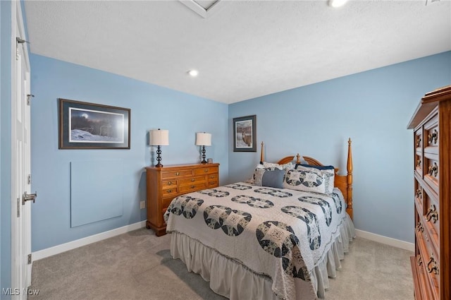 bedroom featuring light carpet