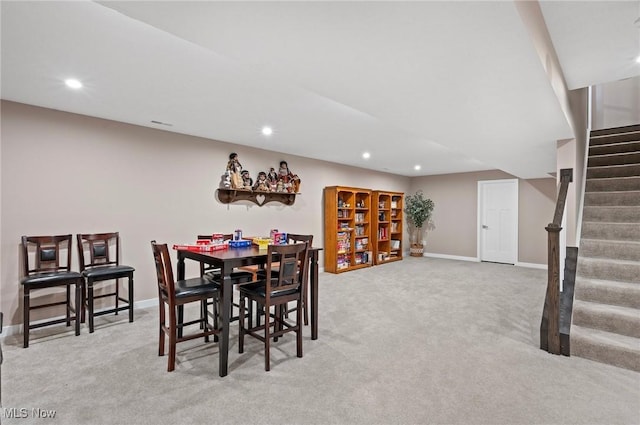 view of carpeted dining space