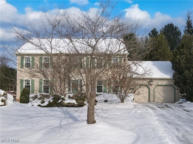 view of front of property featuring a garage