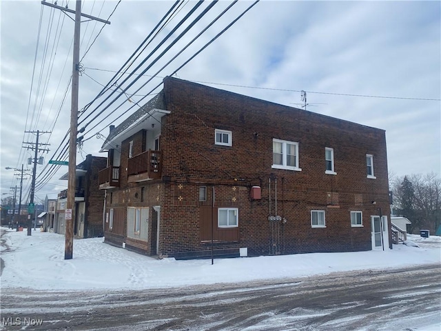 view of snow covered property