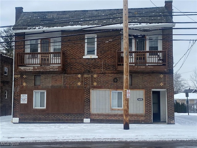 view of snow covered property