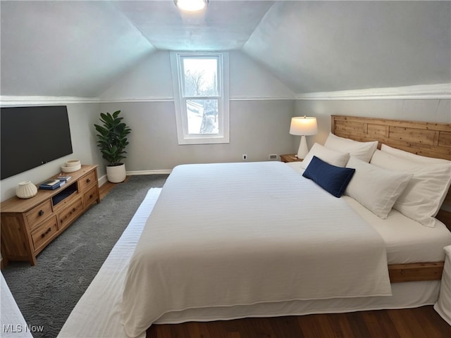 bedroom featuring vaulted ceiling