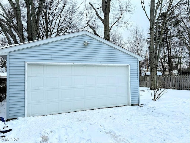 view of snow covered garage