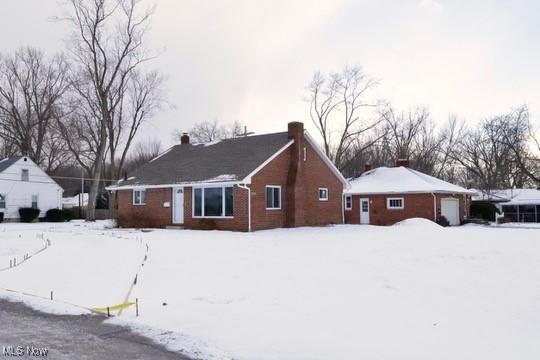 view of snow covered property