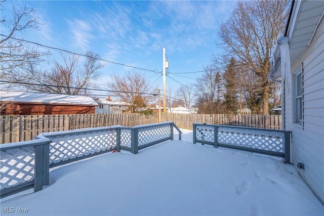 view of snow covered deck