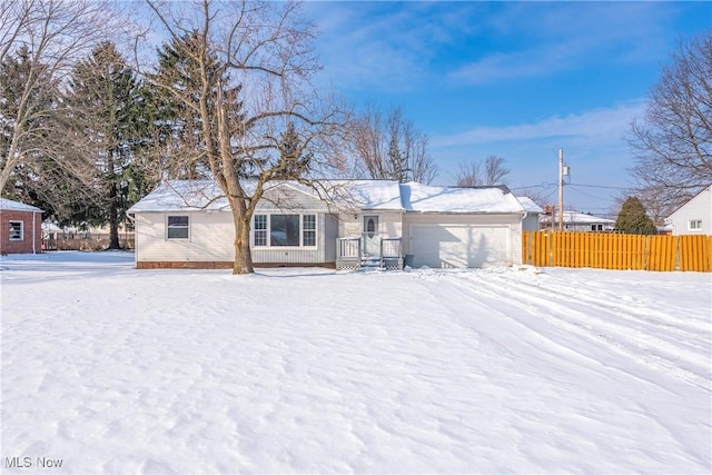 view of front of home with a garage