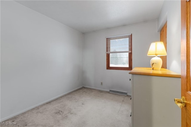 empty room featuring light colored carpet