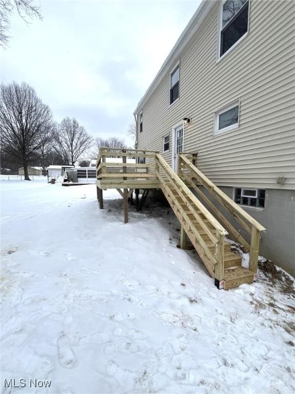 exterior space featuring a wooden deck