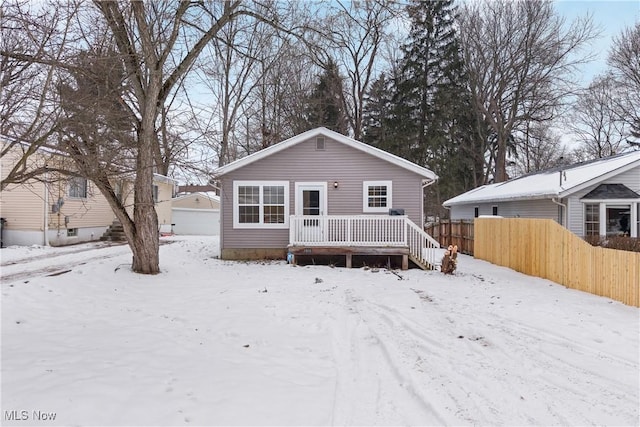 view of front of home with a wooden deck