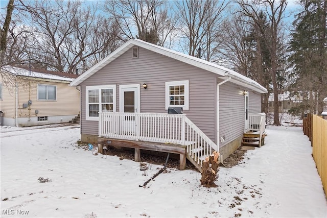 view of front of property featuring a wooden deck