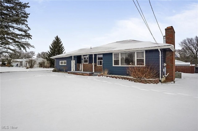 ranch-style house with central AC unit