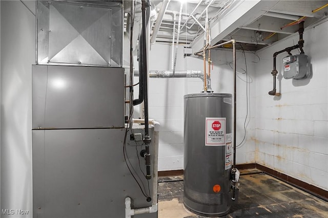 utility room with heating unit and water heater