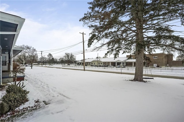 view of yard covered in snow