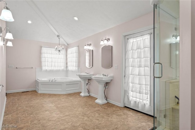 bathroom with lofted ceiling, a chandelier, and separate shower and tub