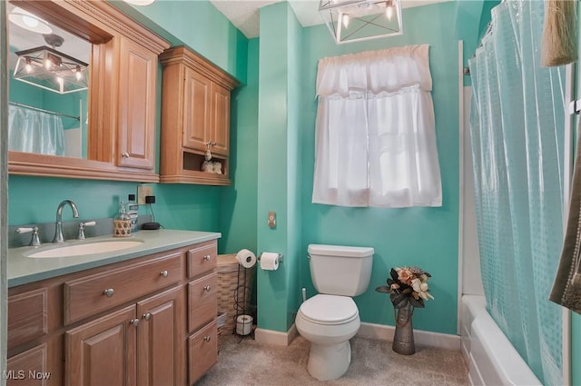 full bathroom with vanity, toilet, and shower / tub combo with curtain