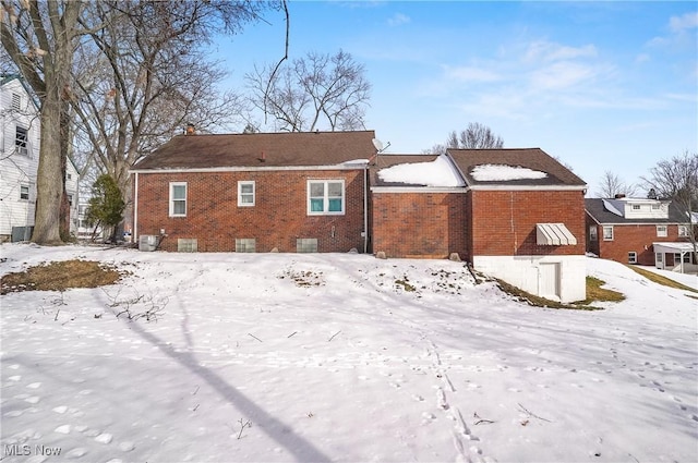 view of snow covered house