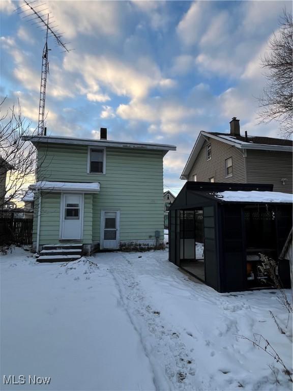 view of snow covered property