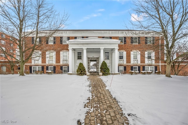 view of snow covered property