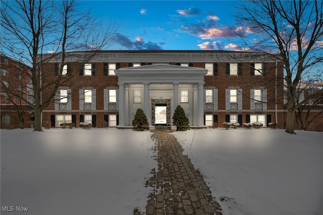 view of snow covered property