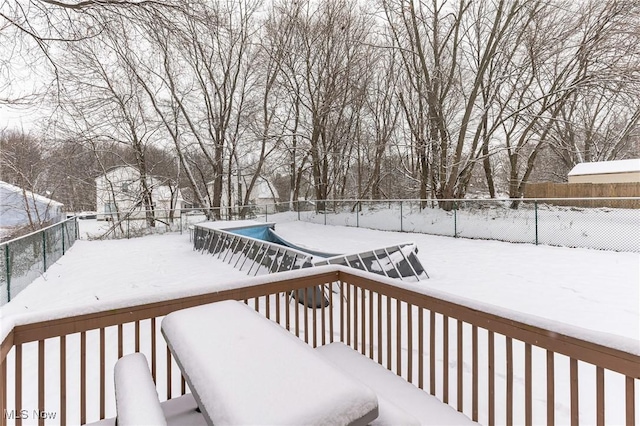 view of snow covered deck