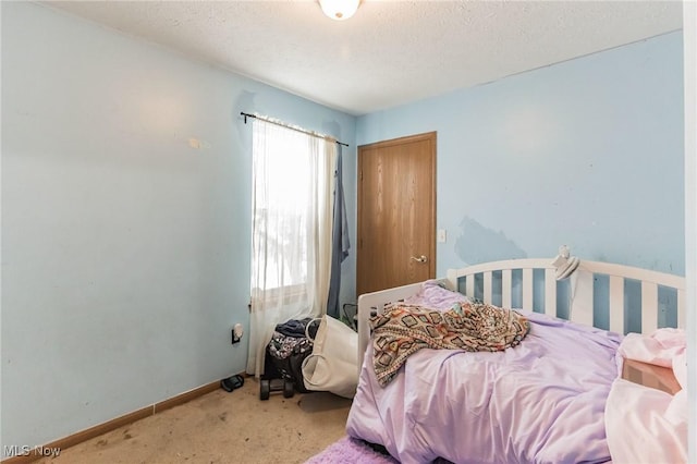 bedroom featuring carpet flooring