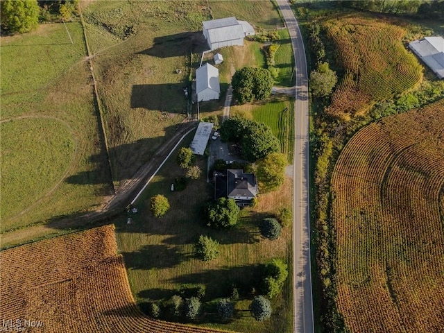 birds eye view of property featuring a rural view