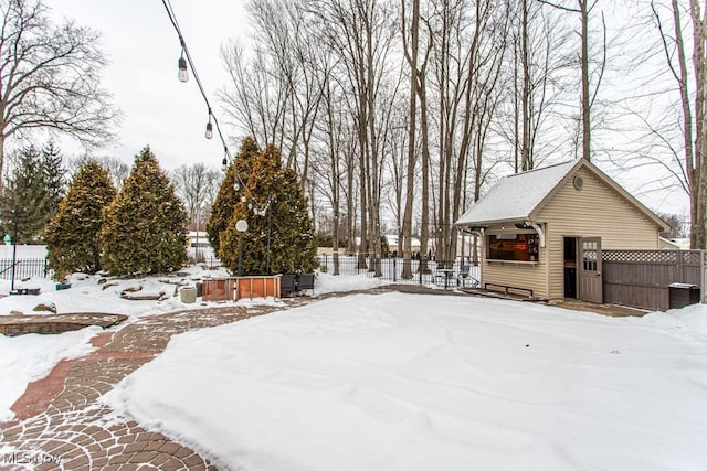 view of yard layered in snow