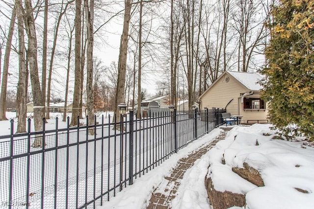 view of yard layered in snow