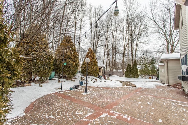 view of yard covered in snow