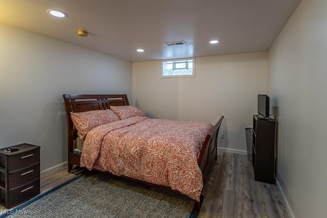 bedroom featuring wood-type flooring