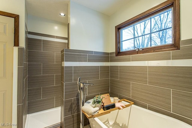 bathroom with tiled shower