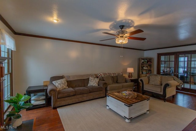 living room featuring hardwood / wood-style floors, crown molding, french doors, and ceiling fan