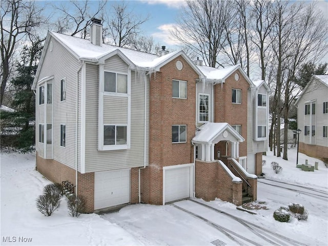 view of front of home with a garage