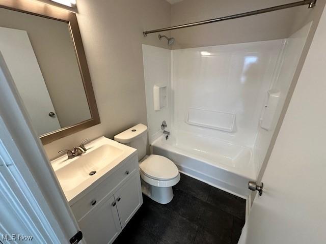 5111 Lucydale Ave, North Olmsted, OH 44070 - bathroom featuring vanity, toilet, and shower / bathtub combination