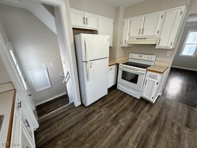 5111 Lucydale Ave, North Olmsted, OH 44070 - kitchen featuring white appliances, under cabinet range hood, dark wood finished floors, light countertops, and white cabinetry