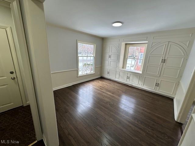 foyer featuring dark hardwood / wood-style floors