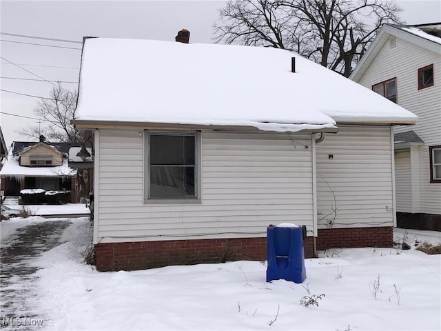 view of snow covered property